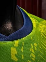 Moghreb Atlético Tetuán green and navy shirt