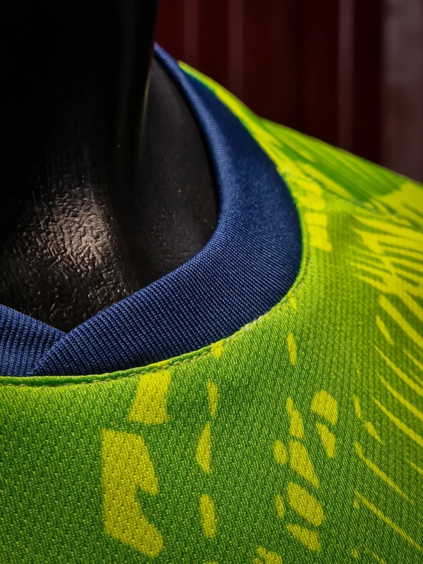 Moghreb Atlético Tetuán green and navy shirt