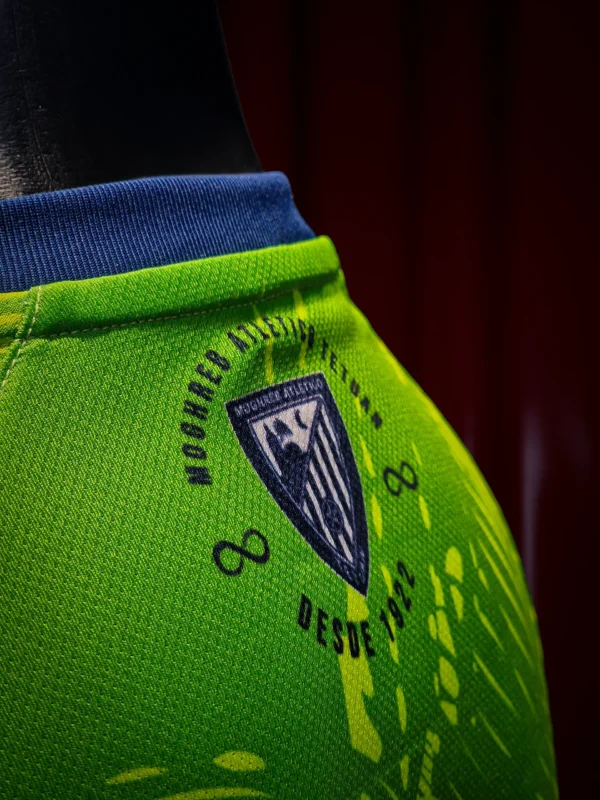 Moghreb Atlético Tetuán green and navy shirt